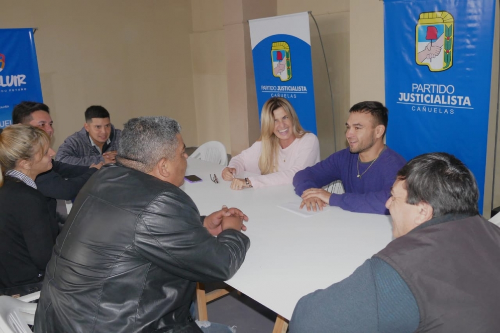 Fassi y Muerza en plena reunión. 